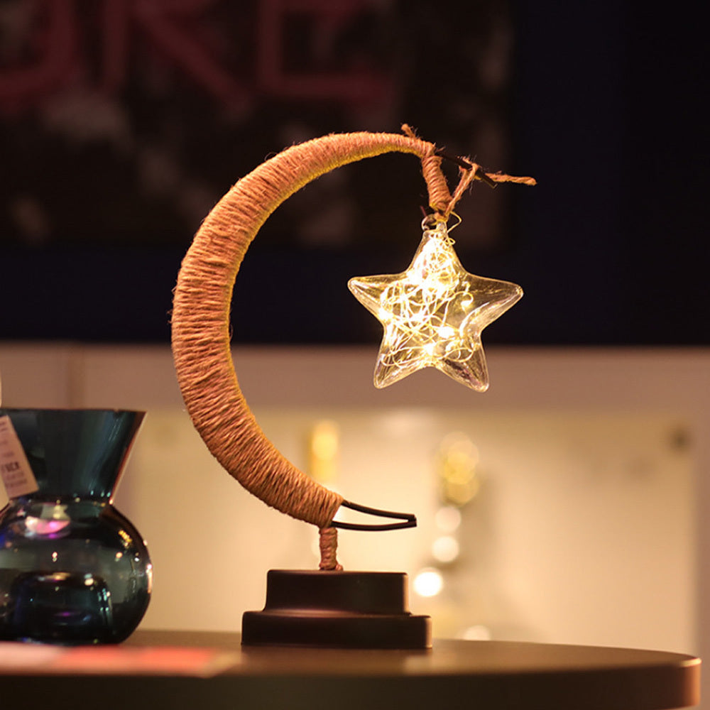 Moon shaped night lamp with the hanging star