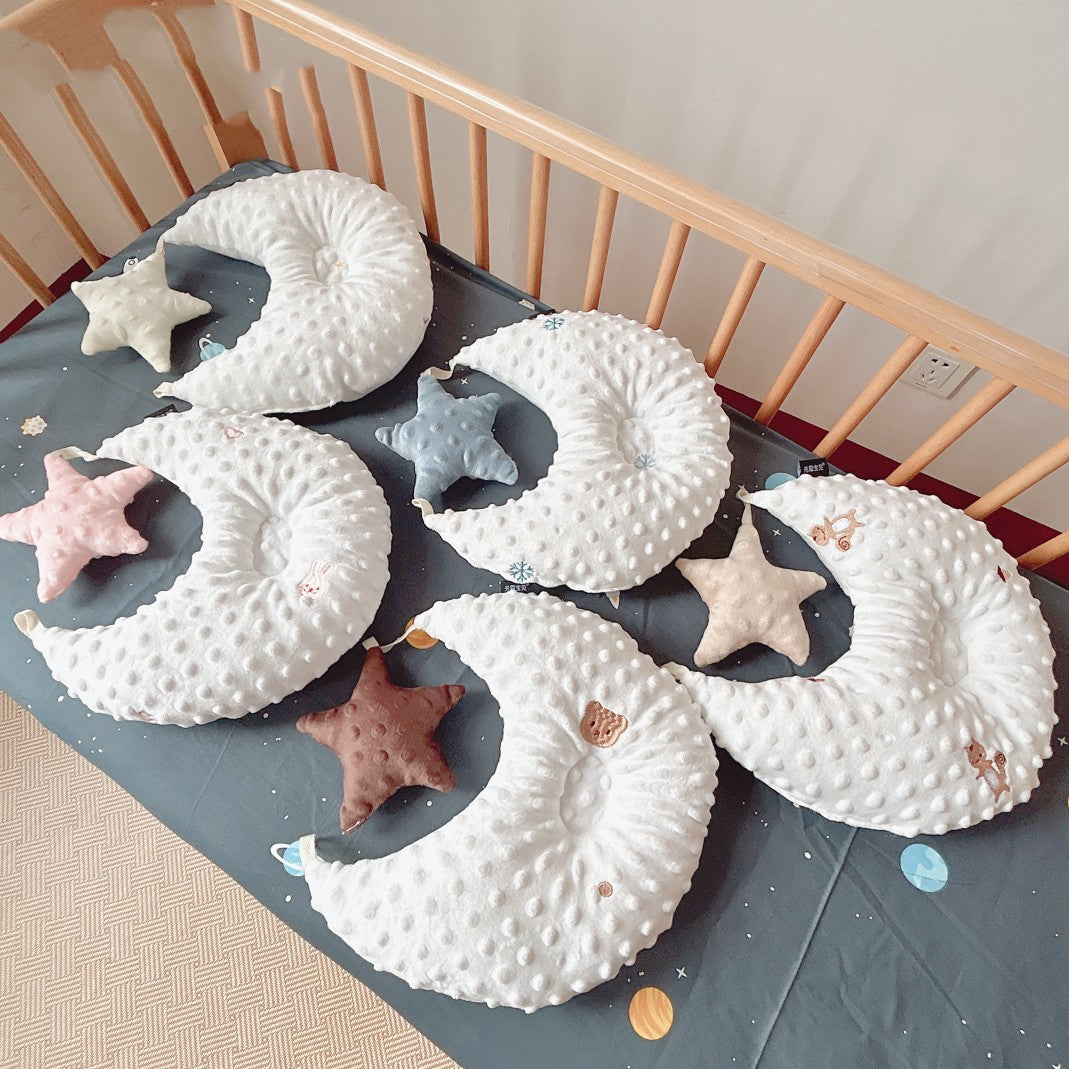 5 Baby Velvet Comforter Shaped Pillow Toys in a cot