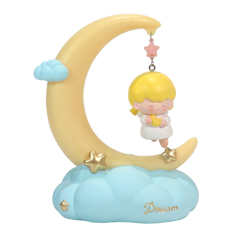 Moon shaped bedside lamp with little angel in the white background