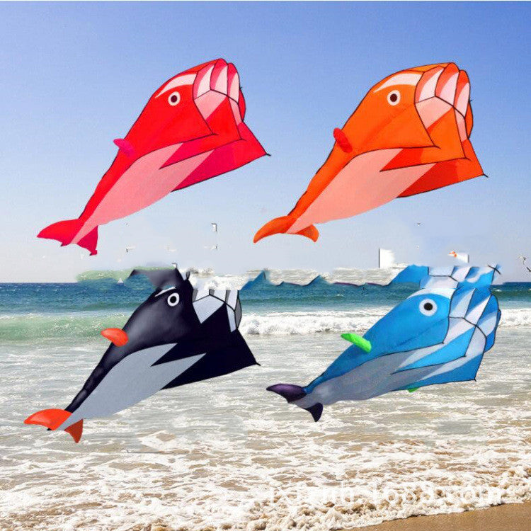 Red, Orange, Black and Blue Dolphin Kites jumping out of Sea