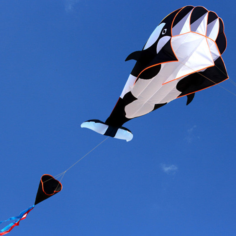 White and Black Dolphin Kite in the Sky
