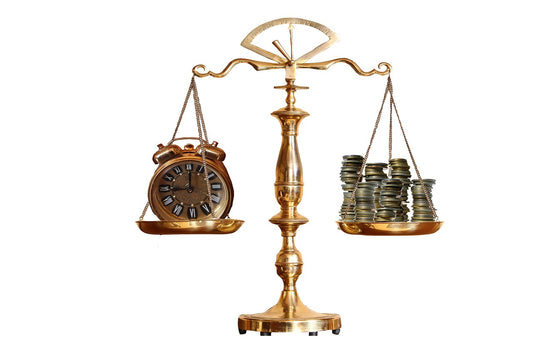 scales balancing money and time