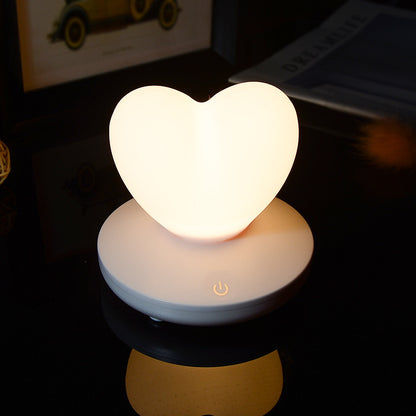 small heart shaped night lamp with white base