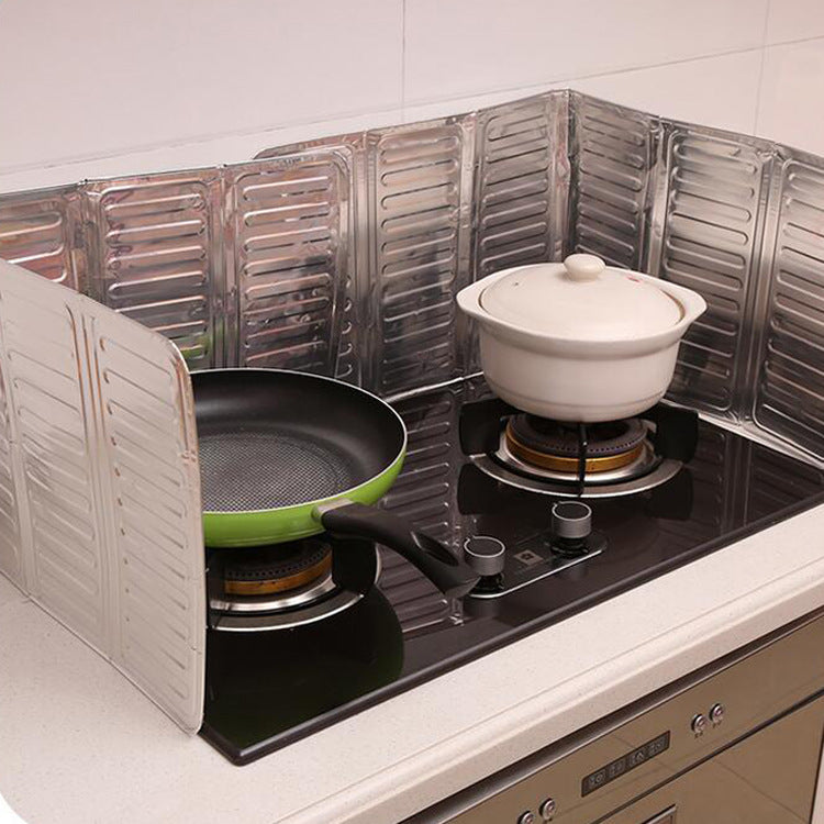 Aluminium Foil Splash Guard covering 2 hobs with frying pan and a pot