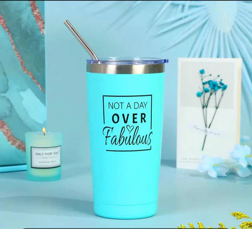 Blue wine tumbler with a writing not a day over fabulous