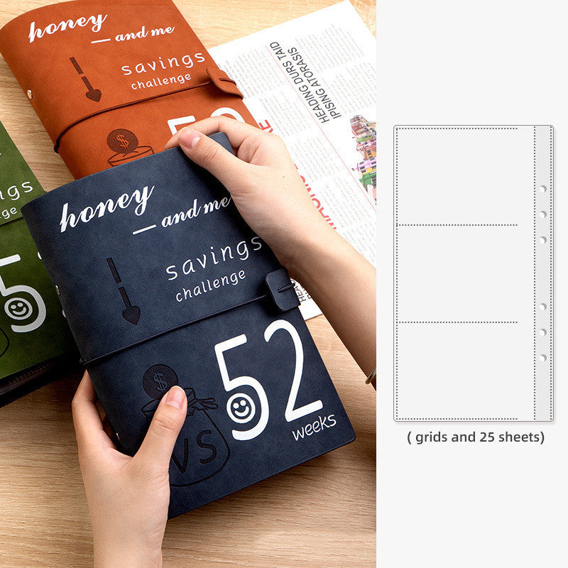 Hands holding blue colour 52 Weeks Couple Challenge Saving Journal Book