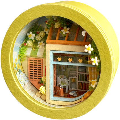 Yellow  Assembling a Small House Model Creative Handmade Toy on a white background