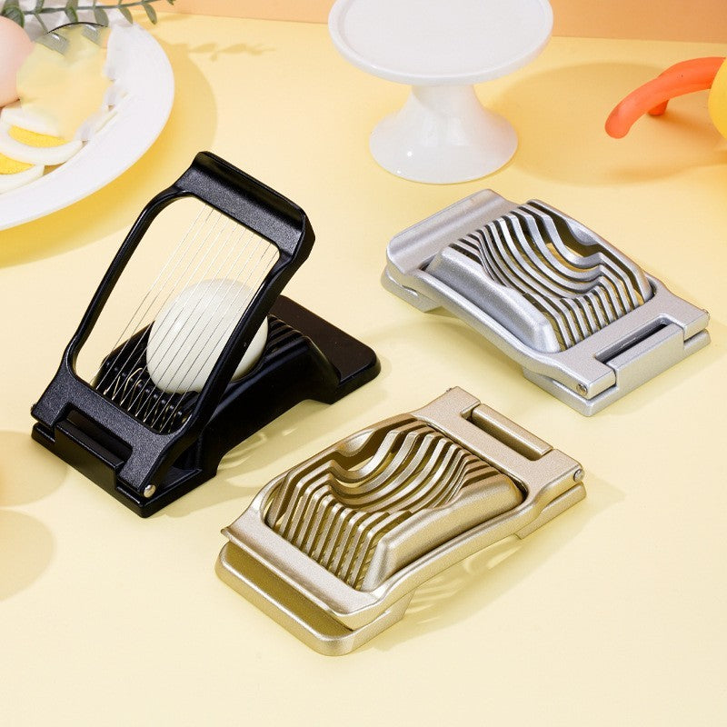 black grey and gold egg cutters