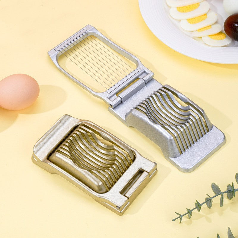 grey open and gold closed egg cutters