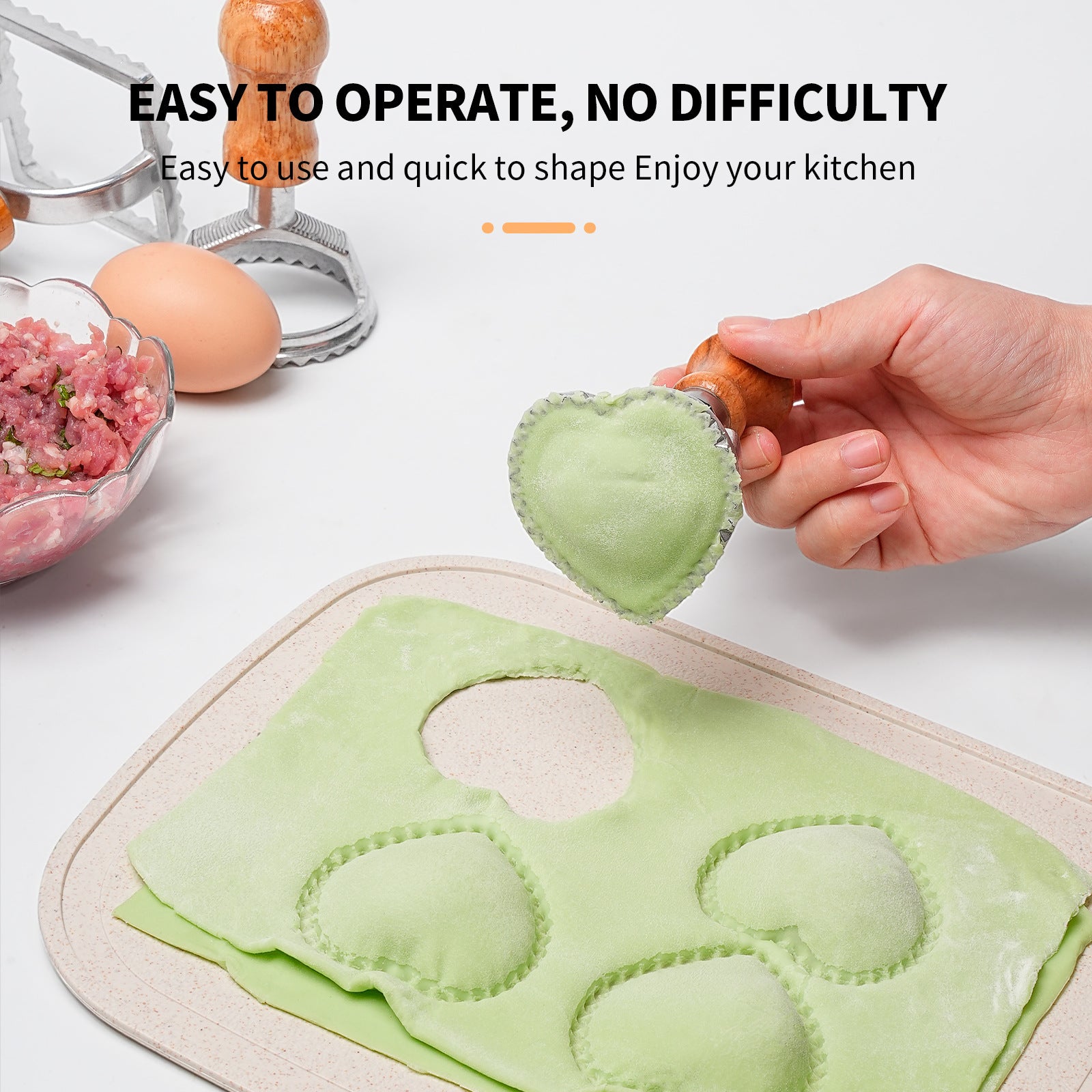 making green dumplings with a dumpling mould