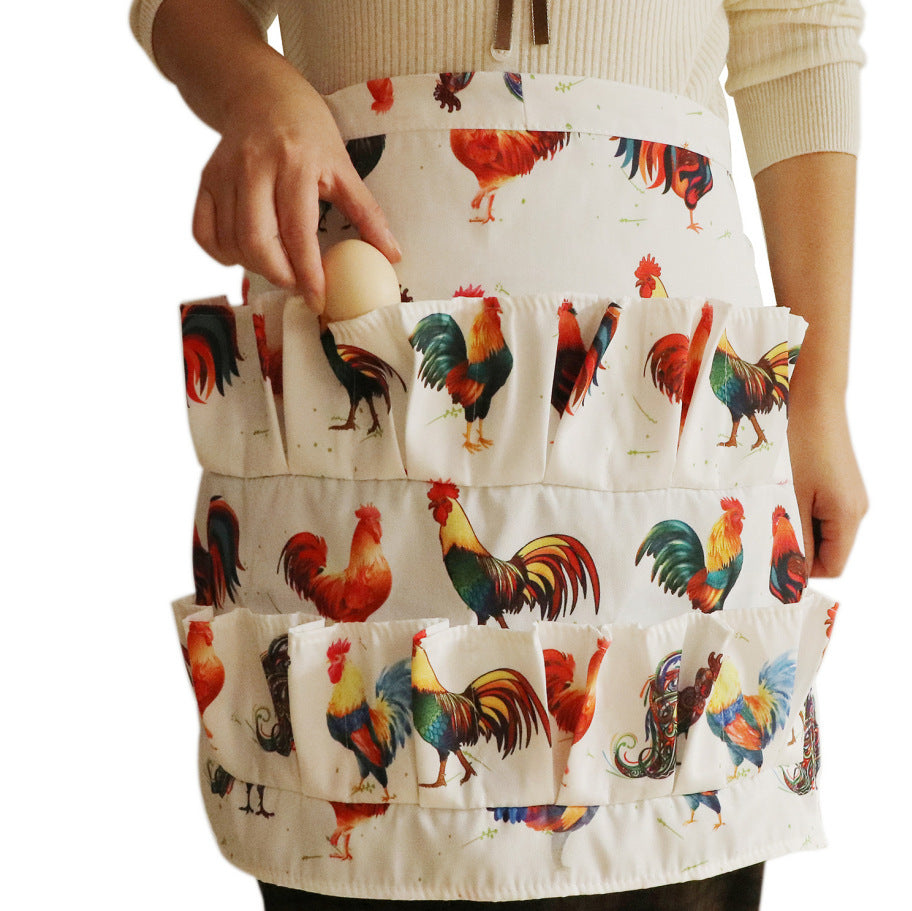 roosters apron with woman putting an egg in it