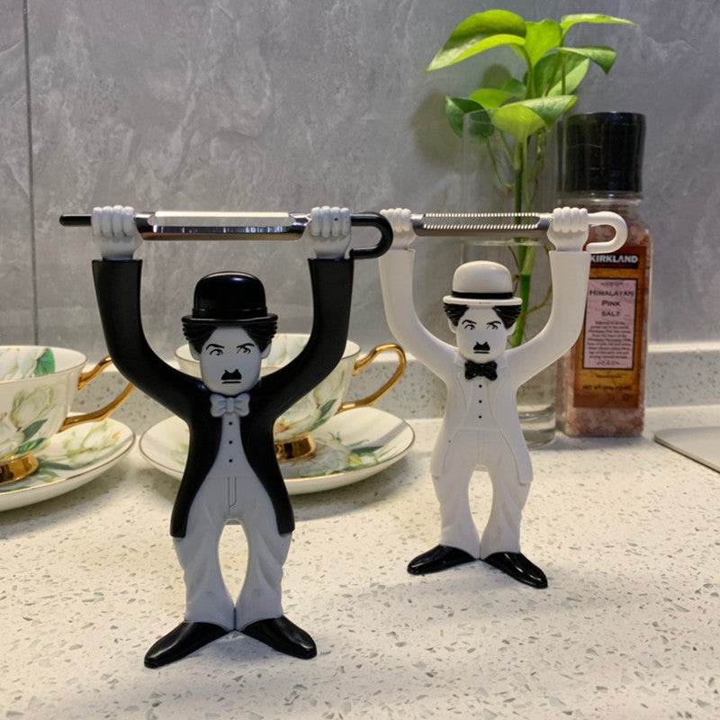 white and black chaplin peeler on the counter