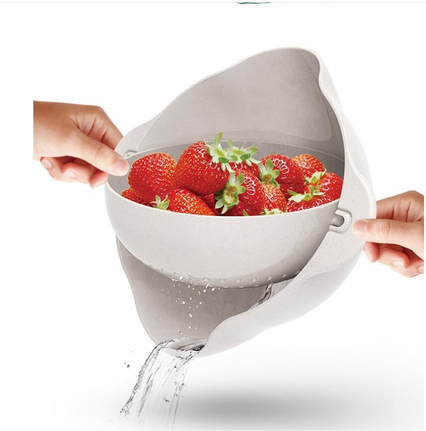 white kitchen strainer with strawberries