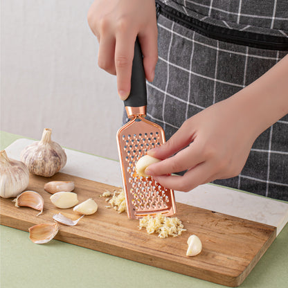 woman grating garlic