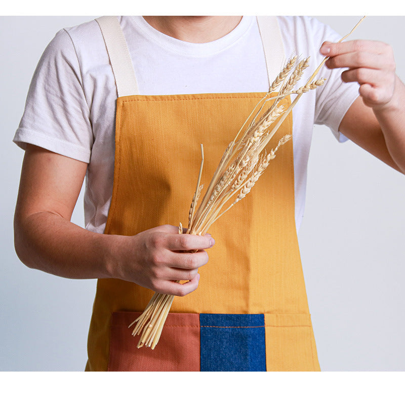 yellow Minimalist Kitchen Baking Apron on a person